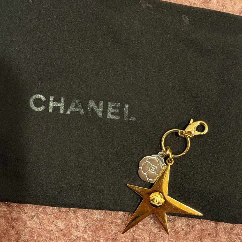 CHANEL Gold Star Key Holder with Silver Charm